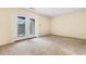 Well-lit bedroom featuring French doors and neutral carpeting at 305 21St Ave. S # 108, Myrtle Beach, SC 29577