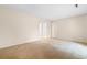 Large living room with neutral carpeting and an open floor plan at 305 21St Ave. S # 108, Myrtle Beach, SC 29577