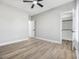 Bright bedroom offers ample space, neutral walls, a ceiling fan, and a closet for storage at 3368 Gurley Rd., Loris, SC 29569