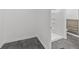 Bathroom features a step-in shower, wood plank wall, and modern tile flooring at 447 Bragdon Ave., Georgetown, SC 29440