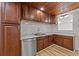 Modern kitchen with stainless steel appliances, white subway tile backsplash, and stylish wood countertops at 447 Bragdon Ave., Georgetown, SC 29440