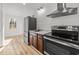 Newly updated kitchen featuring stainless steel appliances and modern finishes at 447 Bragdon Ave., Georgetown, SC 29440