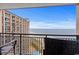 Relax on the condo's balcony with seating and stunning views of the ocean and beach at 4800 S Ocean Blvd. # 1219, North Myrtle Beach, SC 29582