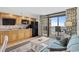 Open living space with a well-equipped kitchen and a balcony overlooking the ocean, great for entertaining at 4800 S Ocean Blvd. # 1219, North Myrtle Beach, SC 29582
