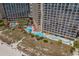 Aerial view of swimming pools featuring landscaped areas, easy beach access, and upscale coastal living at 4800 S Ocean Blvd. # 1219, North Myrtle Beach, SC 29582
