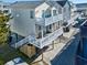 Inviting stilt home with dual balconies, offering stunning elevated views and coastal charm at 6001 - 1045 S Kings Hwy., Myrtle Beach, SC 29575