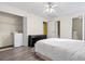 Bedroom featuring a ceiling fan, closet, and white washer-dryer unit in room at 815 Rogers Dr., Myrtle Beach, SC 29577