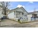 Charming home with blue siding, a white picket fence, and front porch at 815 Rogers Dr., Myrtle Beach, SC 29577