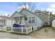 View of exterior featuring light blue vinyl siding, white trim, and well-maintained landscaping at 815 Rogers Dr., Myrtle Beach, SC 29577