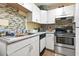 Efficient kitchen featuring modern stainless steel appliances, and light backsplash at 815 Rogers Dr., Myrtle Beach, SC 29577