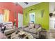 Inviting living room with bright walls, neutral furniture and doorway access to the bedroom at 815 Rogers Dr., Myrtle Beach, SC 29577