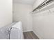 Walk-in closet with white shelving and laminate flooring at 815 Rogers Dr., Myrtle Beach, SC 29577