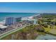 Beautiful aerial view of a beachside resort featuring stunning ocean views and a tranquil river at 9400 Shore Dr. # 312, Myrtle Beach, SC 29572