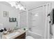Bright bathroom with vanity, mirror, and a shower-tub combination at 9400 Shore Dr. # 312, Myrtle Beach, SC 29572