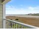 Breathtaking view of the beach from a private balcony on a sunny day at 9400 Shore Dr. # 312, Myrtle Beach, SC 29572