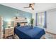 Comfortable bedroom features a plush bed, stylish headboard, and soothing color palette at 9400 Shore Dr. # 312, Myrtle Beach, SC 29572