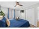 Cozy bedroom boasts a queen bed, ceiling fan, and direct access to ensuite bathroom at 9400 Shore Dr. # 312, Myrtle Beach, SC 29572