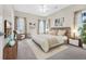 Main bedroom showcasing elegant furniture and decor, bathed in natural light at 158 Regency Dr., Conway, SC 29526