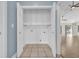 Functional laundry area featuring white cabinets, washer/dryer hookups, and tiled floors, offering convenience and storage at 158 Regency Dr., Conway, SC 29526