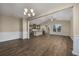 Open concept dining room with hardwood floors and kitchen views at 2548 Brescia St., Myrtle Beach, SC 29579