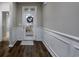 Bright entryway with hardwood floors and white wainscoting at 2548 Brescia St., Myrtle Beach, SC 29579