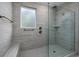 Large walk-in shower with glass enclosure and herringbone tile at 2548 Brescia St., Myrtle Beach, SC 29579