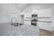 Modern kitchen featuring granite countertops, stainless steel appliances, and white cabinetry at 332 Hayloft Circle, Conway, SC 29526