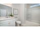 Bright bathroom features a white vanity, toilet, and shower/tub combo with natural light at 550 Haven View Way, Murrells Inlet, SC 29576