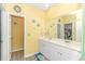 Clean bathroom with double vanity and bright yellow walls at 624 Watercliff Dr., Longs, SC 29568