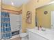 Neat bathroom with a tub shower combo and white vanity at 624 Watercliff Dr., Longs, SC 29568