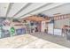 Garage with overhead storage and extra fridge at 624 Watercliff Dr., Longs, SC 29568