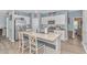 Modern kitchen with white cabinets and granite countertops at 624 Watercliff Dr., Longs, SC 29568