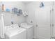 Bright laundry room with washer and dryer at 624 Watercliff Dr., Longs, SC 29568