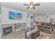Spacious living room with comfortable seating and a large TV at 624 Watercliff Dr., Longs, SC 29568