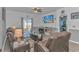 Relaxing living room featuring comfortable seating, a large TV, and a fireplace at 624 Watercliff Dr., Longs, SC 29568