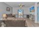 Living room with a leather couch and sliding glass doors at 624 Watercliff Dr., Longs, SC 29568