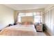 Cozy bedroom featuring a striped comforter and wood dresser at 1204 Erin Way # 1204-F, Myrtle Beach, SC 29577