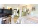 Spacious bedroom with TV, dresser, and access to bathroom at 1204 Erin Way # 1204-F, Myrtle Beach, SC 29577