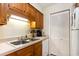 Kitchen with wood cabinets and sink at 1204 Erin Way # 1204-F, Myrtle Beach, SC 29577