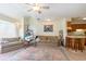 Living room with couch, chair, and area rug at 1204 Erin Way # 1204-F, Myrtle Beach, SC 29577