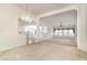 Spacious dining room with chandelier and open floor plan at 1228 Lanterns Rest Rd., Myrtle Beach, SC 29579