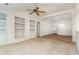 Open living room with built-in shelving and high ceilings at 1228 Lanterns Rest Rd., Myrtle Beach, SC 29579