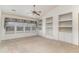 Living room with built-in shelving and window seat at 1228 Lanterns Rest Rd., Myrtle Beach, SC 29579