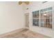 Sunroom with view into kitchen and access to backyard at 1228 Lanterns Rest Rd., Myrtle Beach, SC 29579