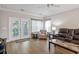 Living room with French doors leading to balcony at 142 Birch N Coppice Dr. # 8, Surfside Beach, SC 29575