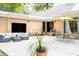 Spacious backyard patio with comfortable seating and dining areas at 272 Old Ashley Loop, Pawleys Island, SC 29585