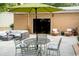 Relaxing patio features a table, chairs, and comfy outdoor sectional sofa at 272 Old Ashley Loop, Pawleys Island, SC 29585
