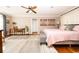 Bright bedroom with hardwood floors and a sitting area at 272 Old Ashley Loop, Pawleys Island, SC 29585