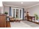 Bedroom with hardwood floors, a desk, and access to a patio at 272 Old Ashley Loop, Pawleys Island, SC 29585