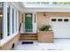 Brick front entry with green door and sidelights at 272 Old Ashley Loop, Pawleys Island, SC 29585